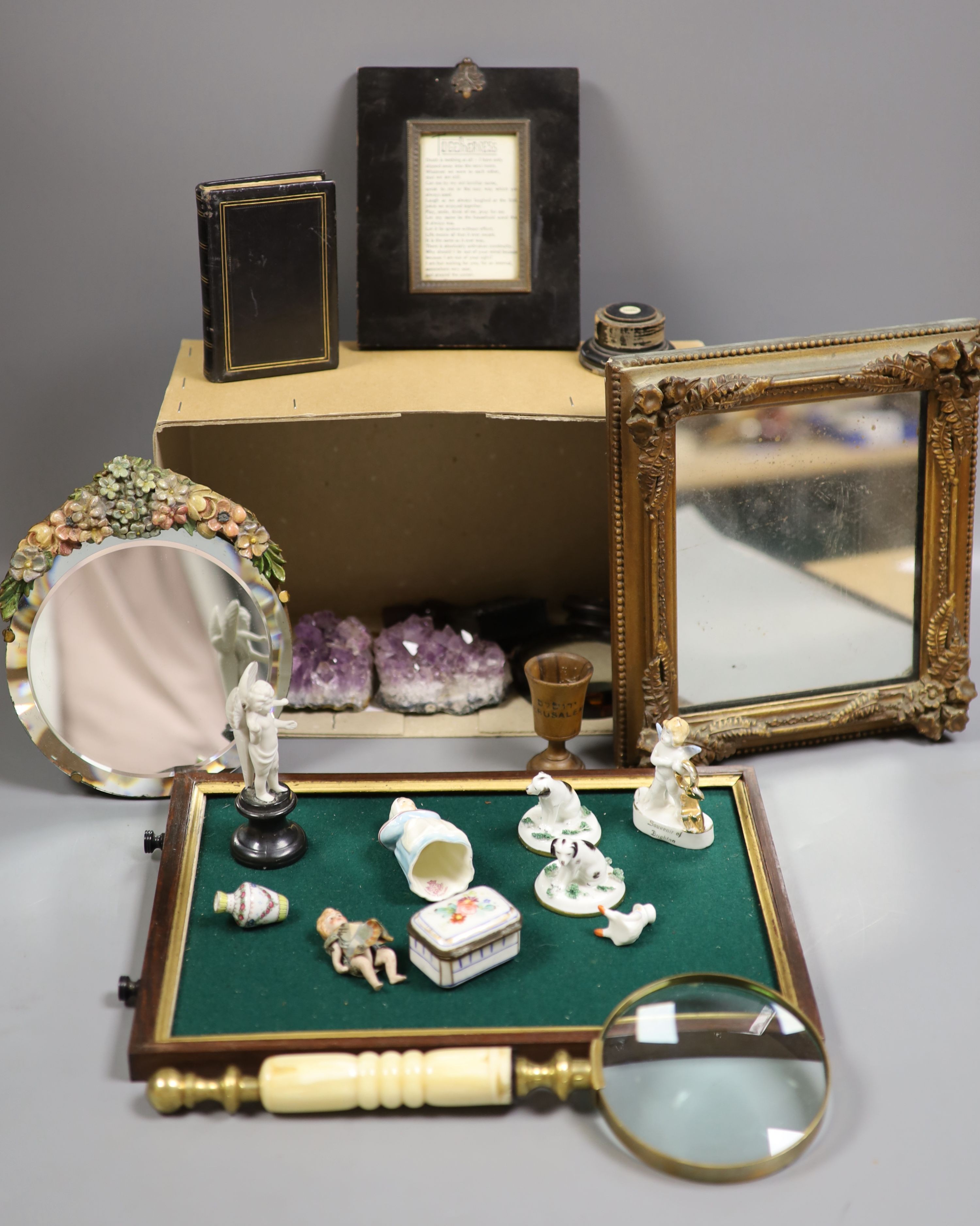 A group of objects of vertu, various frames, magnifying glasses etc.